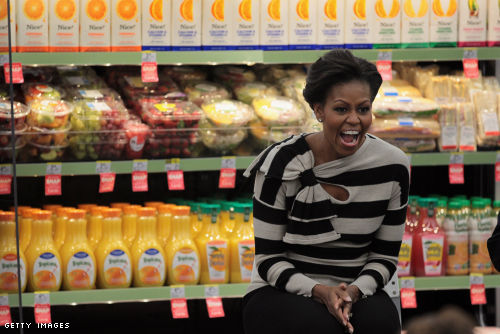 First Lady Michelle Obama promotes healthy food options at a Walgreen's store in Chicago