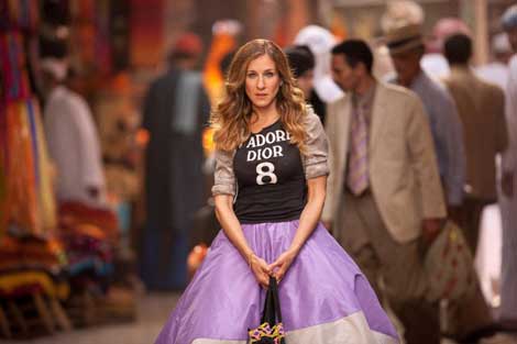 Sarah Jessica Parker as Carrie in Sex and the City 2 wearing the underskirt of a Zac Posen ballgown with a Dior T-shirt worn over a lame blouse in a souk
