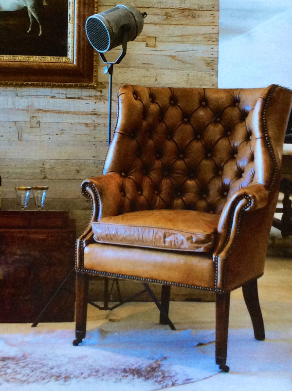 Here is the same wingback chair, I bought as a pair this one done in weathered leather and tufted, One chair and two different ways of approaching the look!.