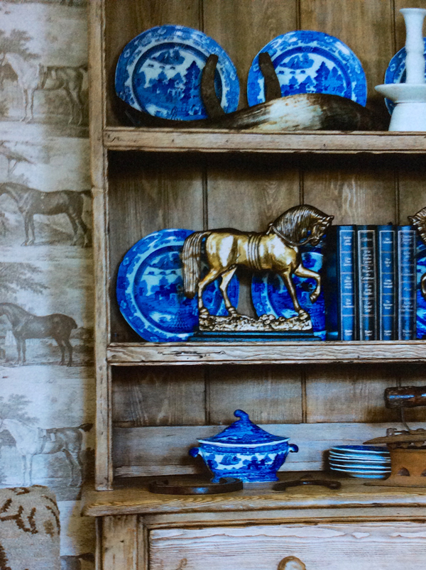The Horse wallpaper in Smoke I found online with an adhesive back for easy removal, The blue spode dinnerware and turin I carried back from London. The pine Buffet Cabinet came out of a farmhouse in Connecticut