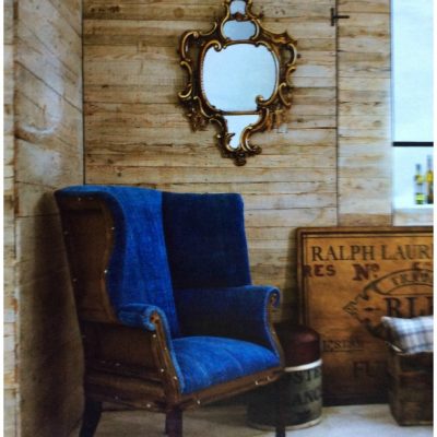 This chair was only the bones when I found it at the Brimfield Flea Market, I left the back exposed and used a deep blue Chanel Velvet. The mirror was found in my mother attic. The vintage sign came from the 25th street Flea Market in New York City