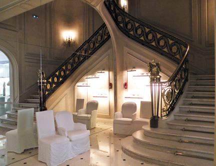 The simplicity of white against the lavish staircase