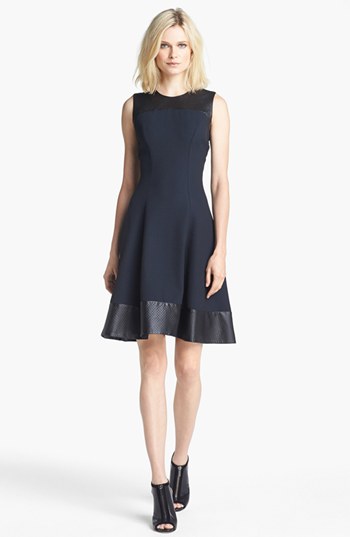Wanna get a bit fancier? Try this L'AGENCE Embossed Leather Trim Ponte Knit Dress.