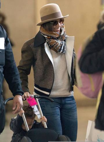 Alicia Keys arrives on a flight at the Roissy Charles de Gaulle airport with her son Egypt in Paris, France.