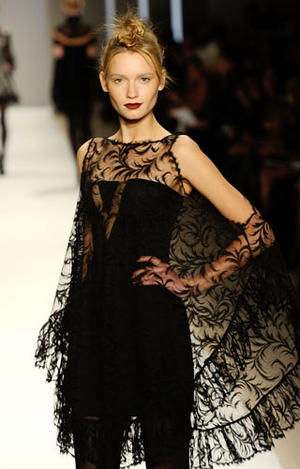 Editions by Georges Chakra black crepe dress with Chantilly lace overlay from the Fall 2010 collection as shown at Mercedes Benz Fashion Week New York