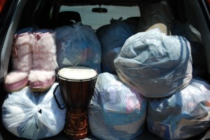 Pink Moon Boots and a whole lotta excess being hauled to the thrift shop