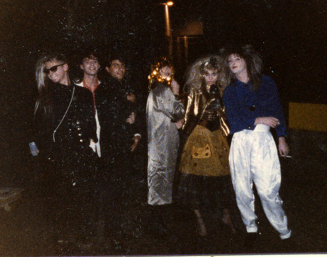 Blast from Halloween Past: Sharon and I hit the streets for a Halloween party a million years ago! We're on the far right. My white silk Hammer pants and her bronze Betsey Johnson dress look modern, still.