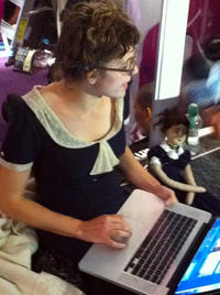 Working it with her Mini Me doll.